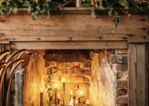 candlestick in fireplace brick with wood mantle and surround