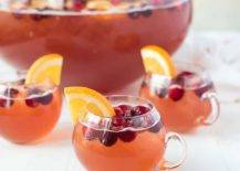 cocktail with cranberries and orange slice