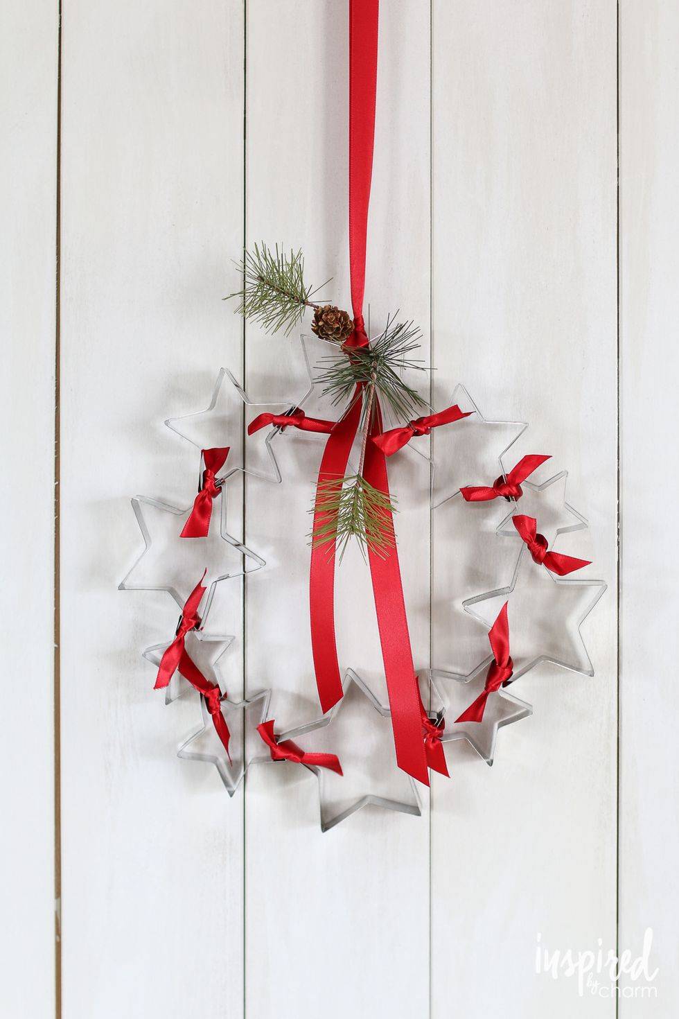stainless steel cookie cutter star wreath with red ribbon