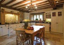 country chic cottage kitchen wood beam ceilings cottage style wood table white cabinetry chandelier