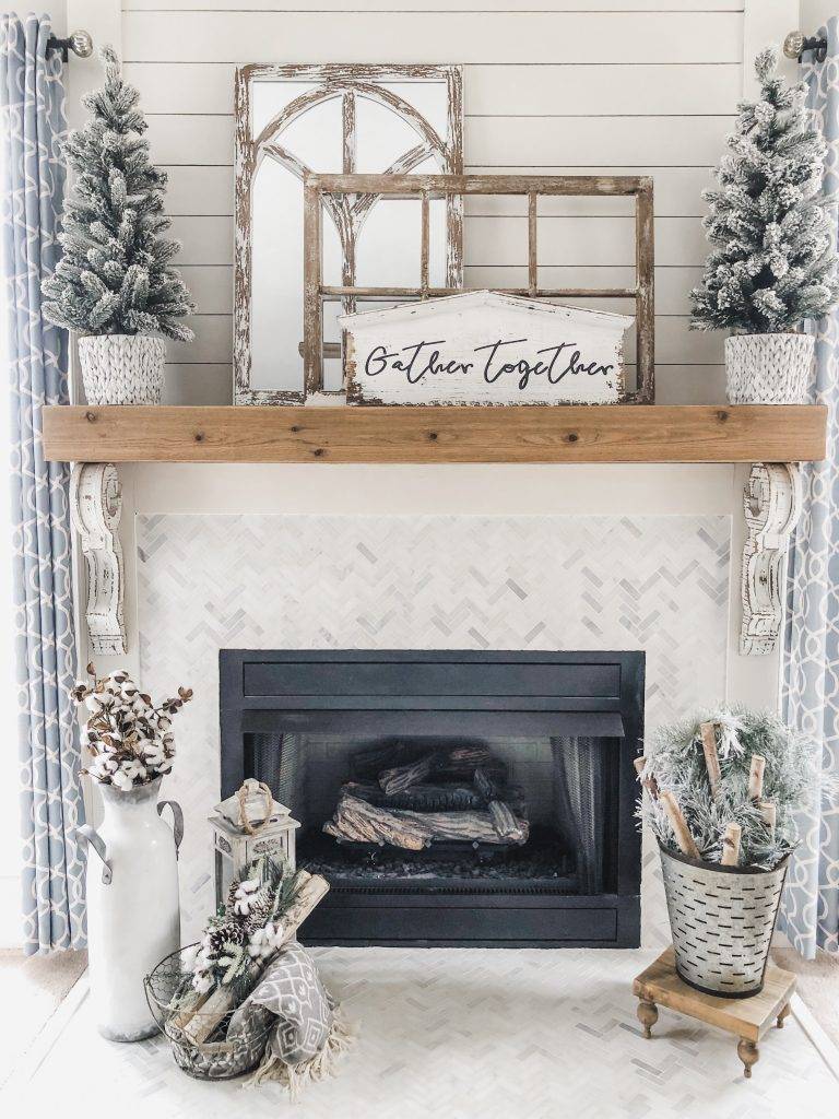 Cozy-Winter-Living-Room-decor-fireplace-with-flocked-trees-and-birch-logs--768x1024