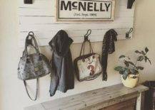 farmhouse country chic entry way pallet sign wood shelf old wood bench hanging jackets and greenery