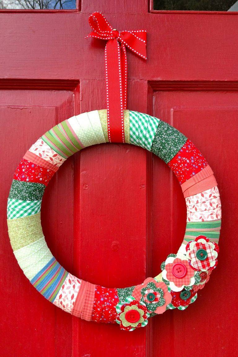 fabric diy christmas wreath hanging on red door