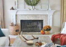 white living room city farmhouse with framed windows above mantle on fireplace white couches country chic style