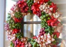 gift bow wreath hanging on front door