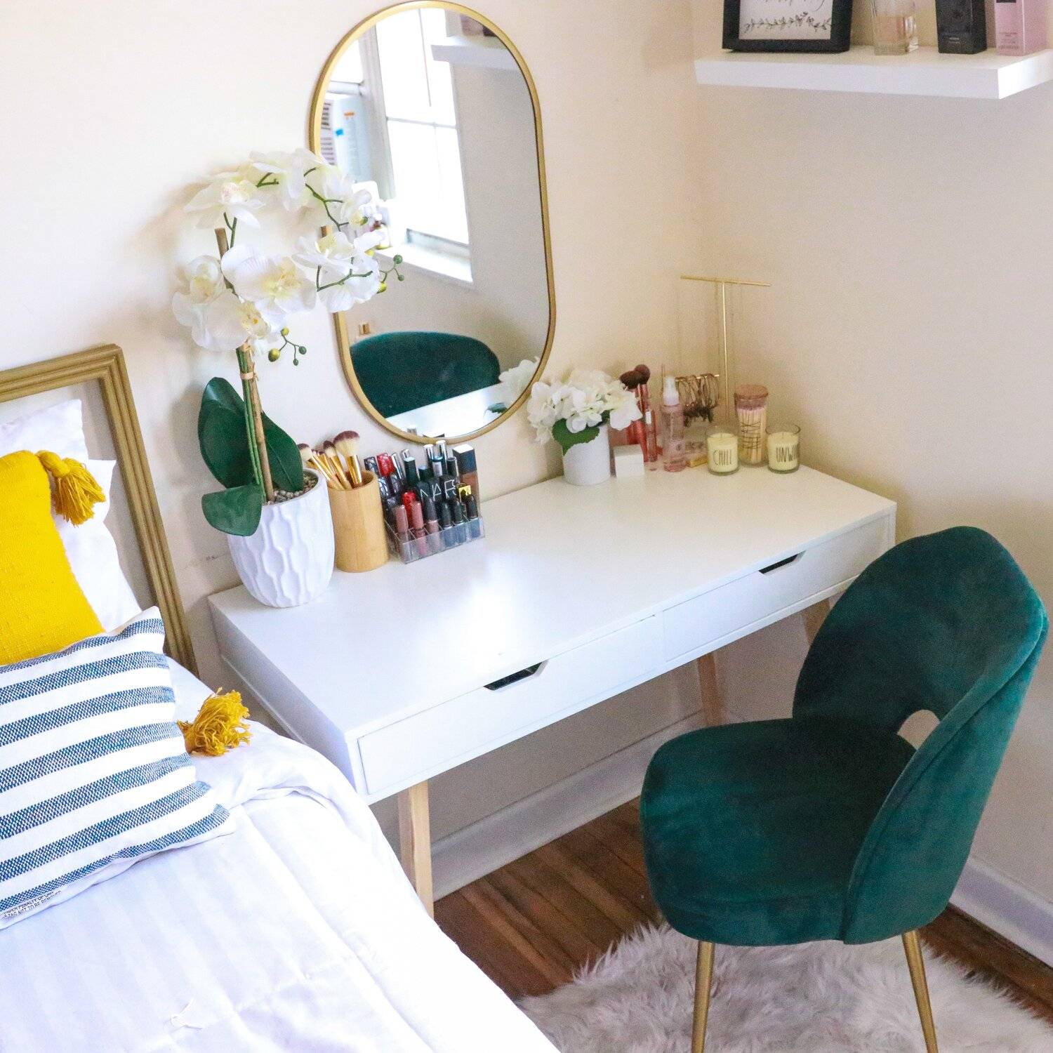 white desk in front of green chair