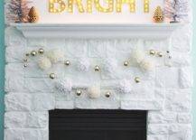 merry and bright marquee sign on white fireplace