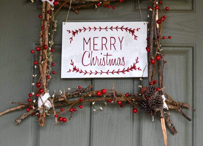 natural sticks wreath with merry christmas sign
