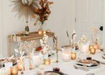 A Thanksgiving table setting with flowers