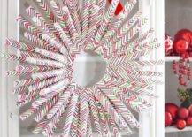 wrapping paper DIY christmas wreath hanging on cupboard