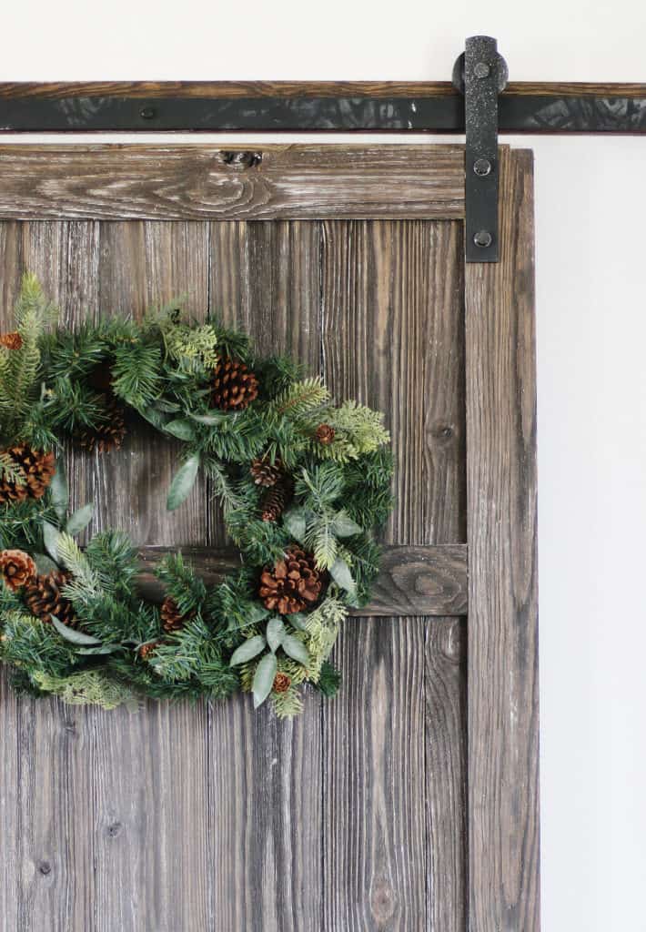 barn-door-with-wreath-710x1024
