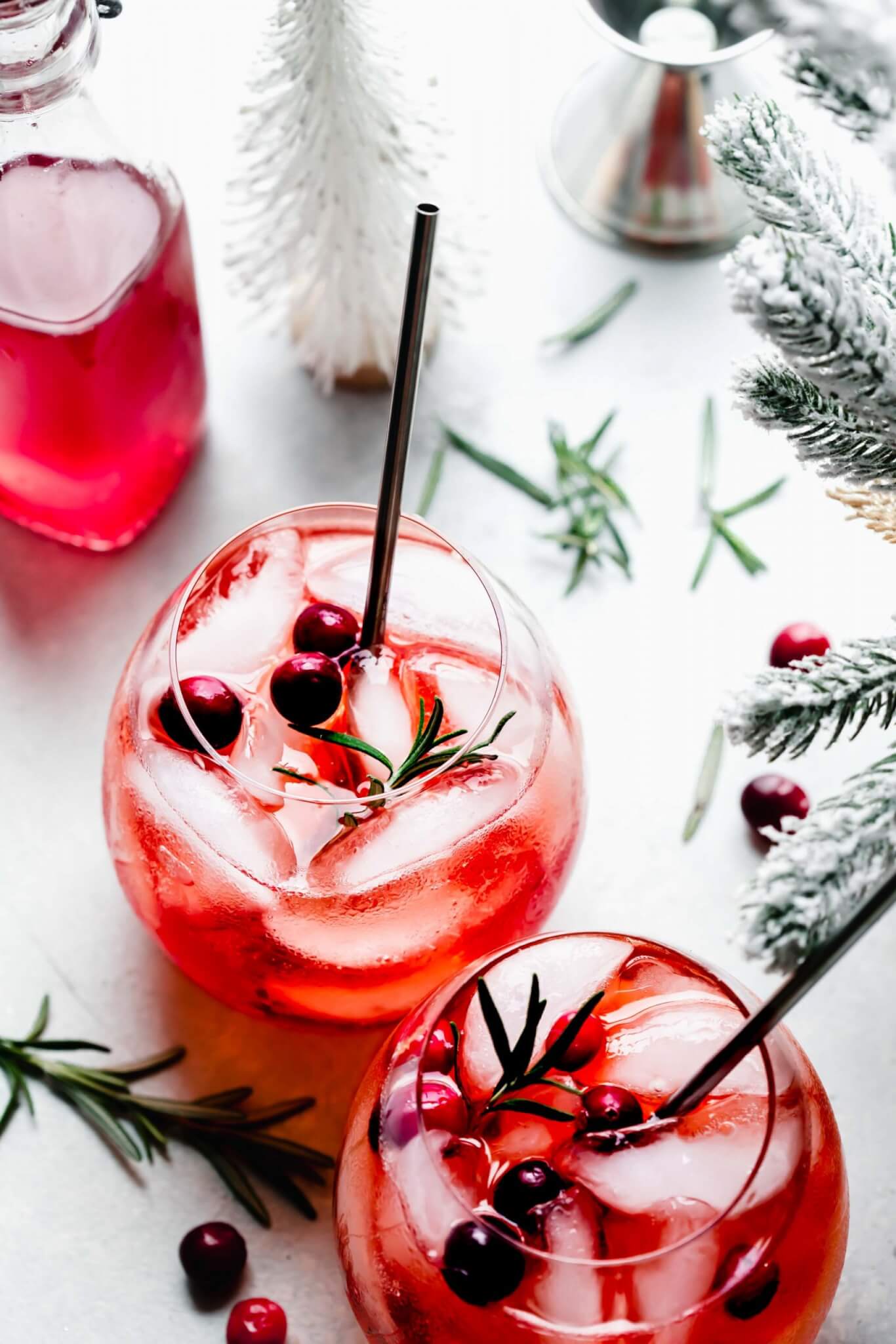 red cocktail with rosemary sprigs