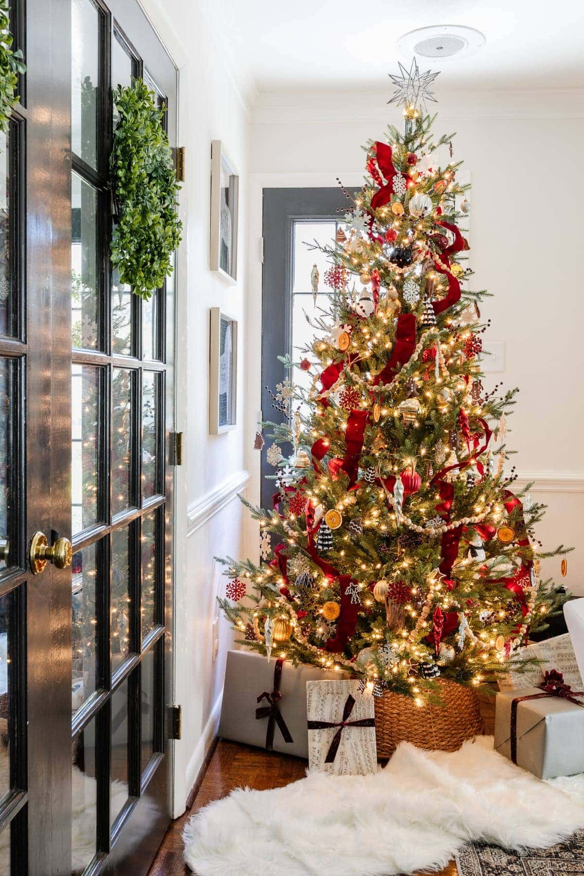 Christmas tree with red ribbon