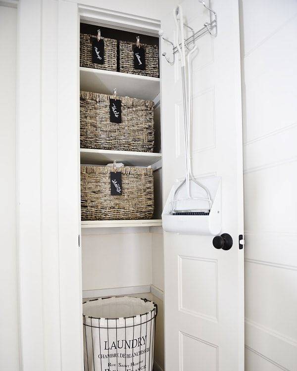 over the door wire rack wicker baskets in white linen closet