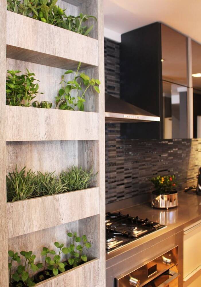 built in herb pots in shelves in kitchen