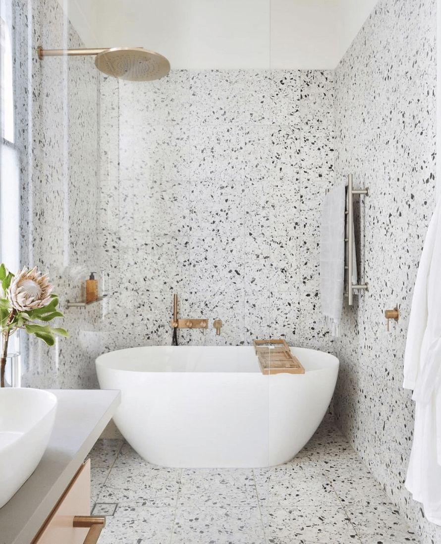 floor to ceiling terrazzo floor shower surrond free standing bath tub