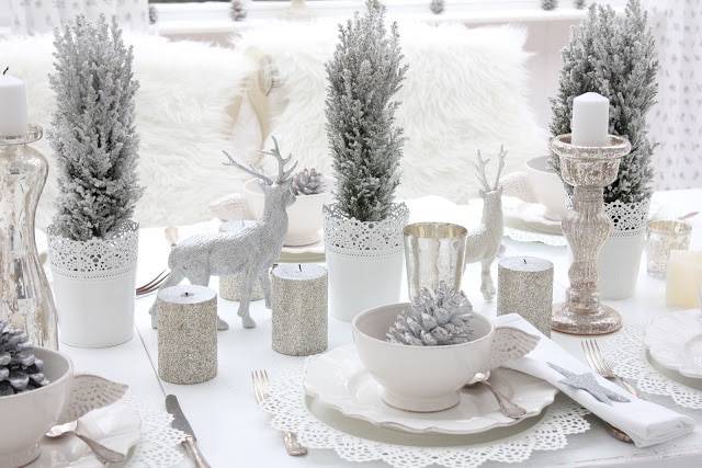 white christmas table with faux greenery white dishes reindeer