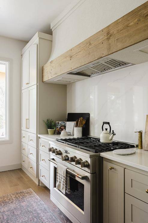 Stainless Steel Kitchen Hood with Brass Trim - Transitional - Kitchen