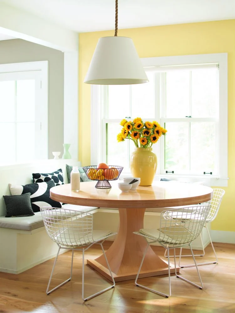 dining table yellow wall