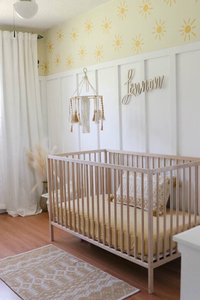 nursery with yellow and white wall