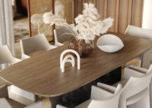 close up of wooden dining room table with various decor elements displayed