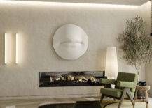 contemporary art large mouth sculpture mounted on living room wall with green chair, fireplace, and colored rug