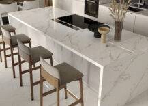 marble kitchen island with wood and fabric bar stools
