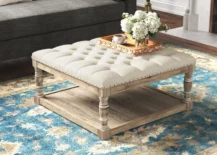 tufted ottoman coffee table with table tray and flowers