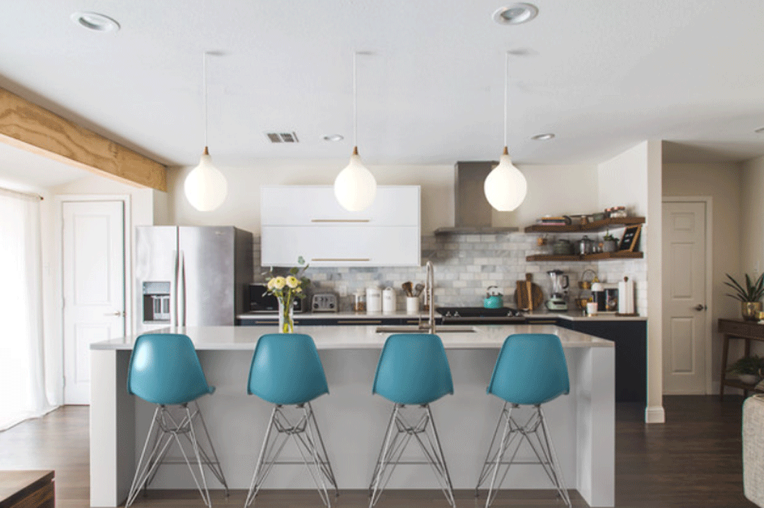 blue barstools in a neutral kitchen