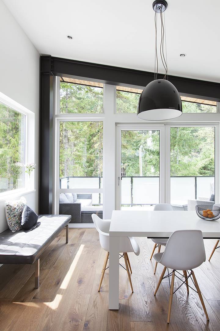 white dining set under black industrial light