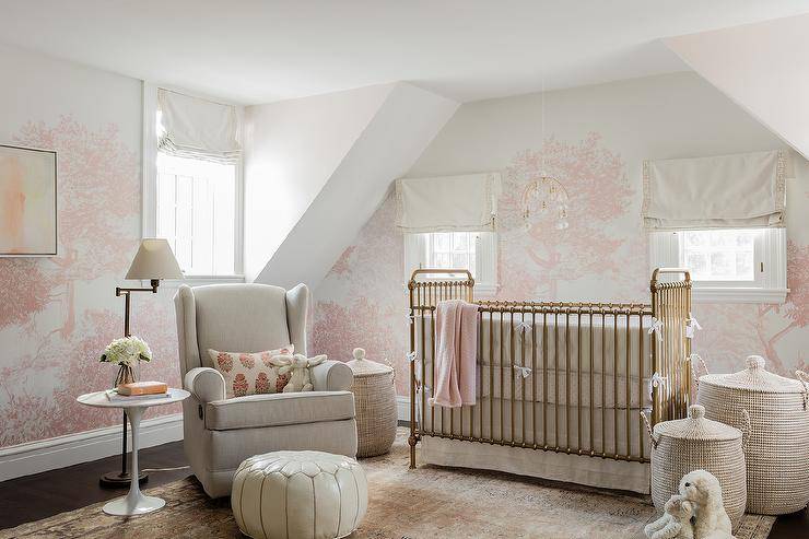 A child's room in soft pink hues
