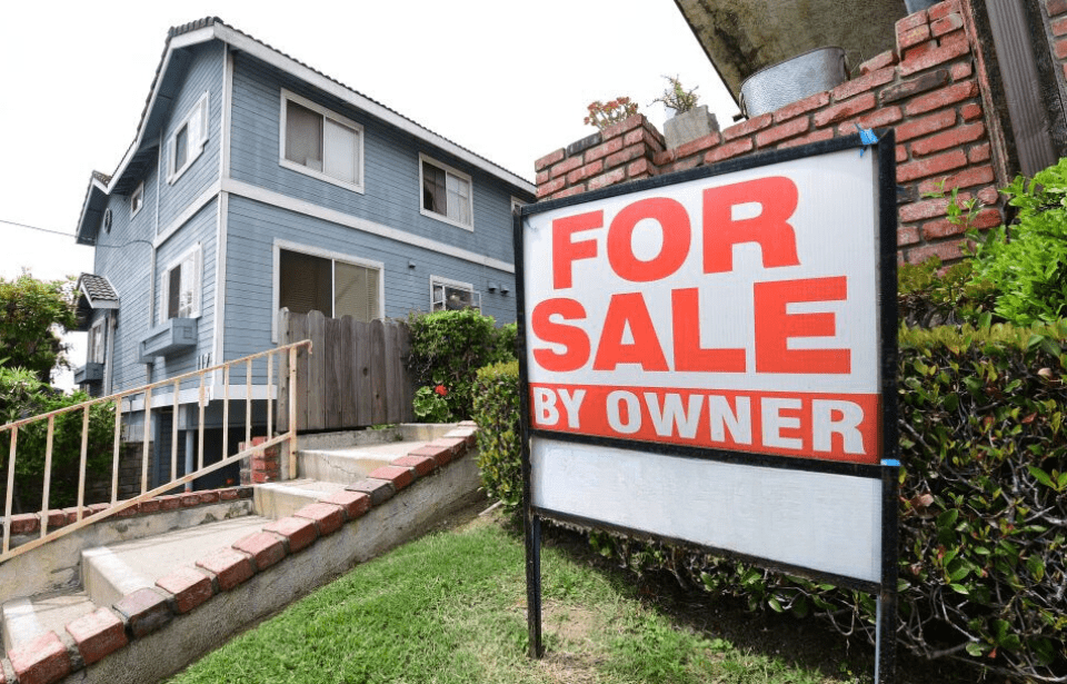 A "For Sale by Owner" sign is posted in front of property in Monterey Park, California