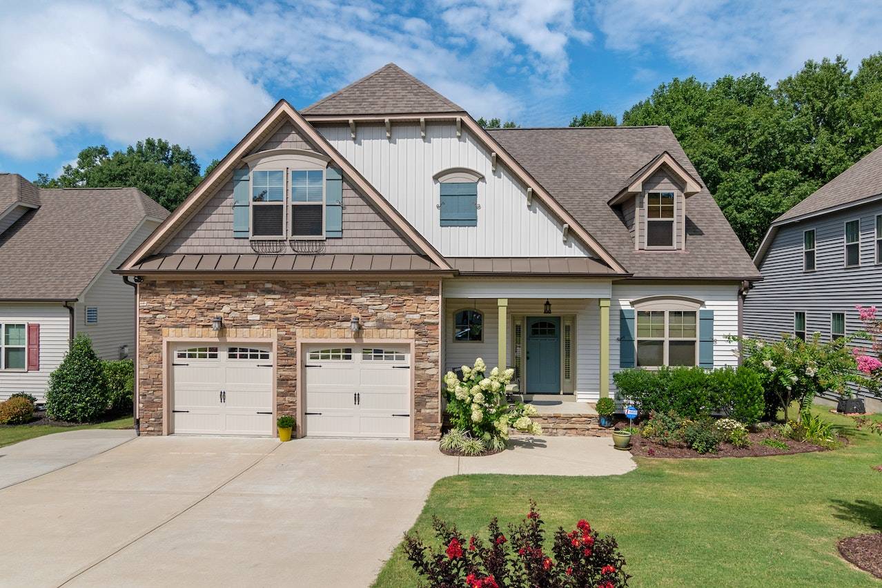 Street view of a home with a two-car garage