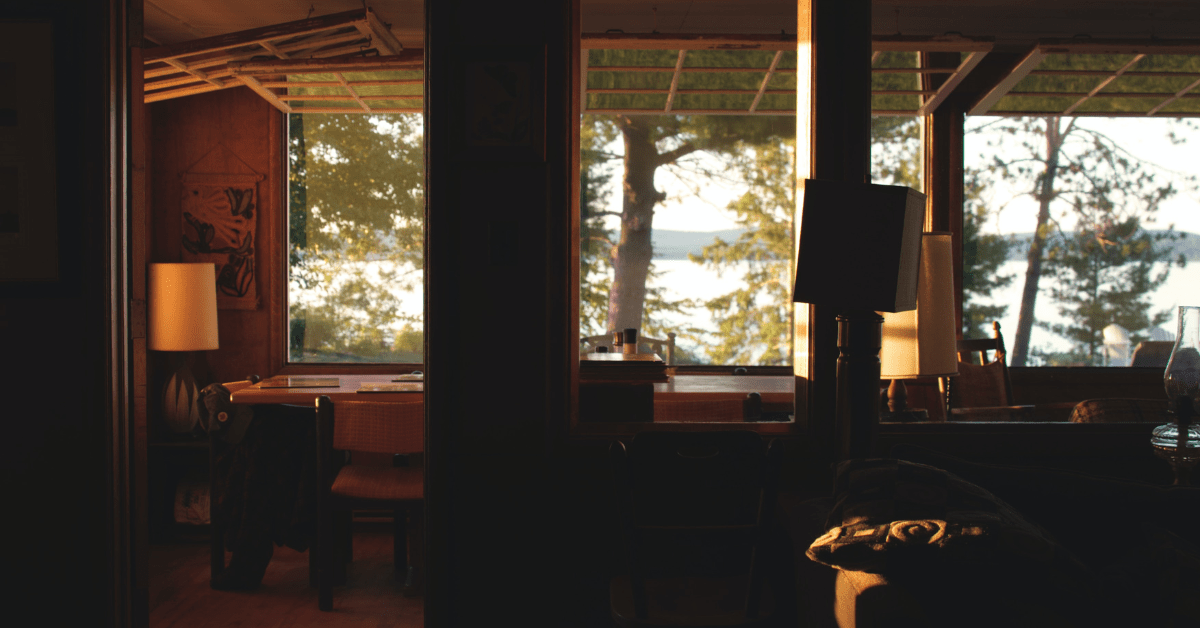 Dimly lit interior of a cottagecore house.