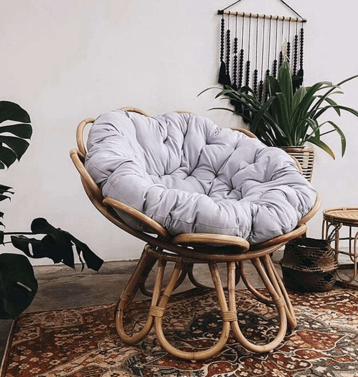bamboo papasan chair with light purple cushion