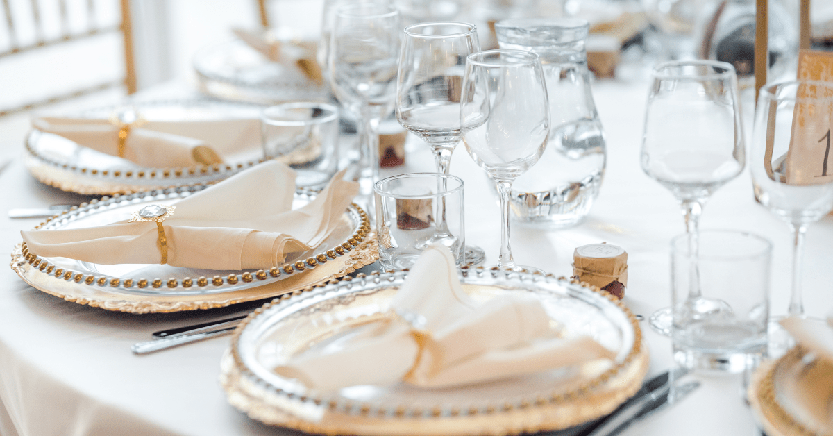 Table setting in white and  gold.