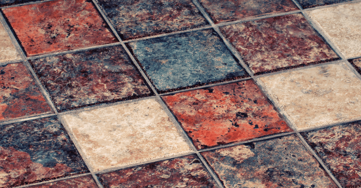 Terracotta floor tiles in various colors.