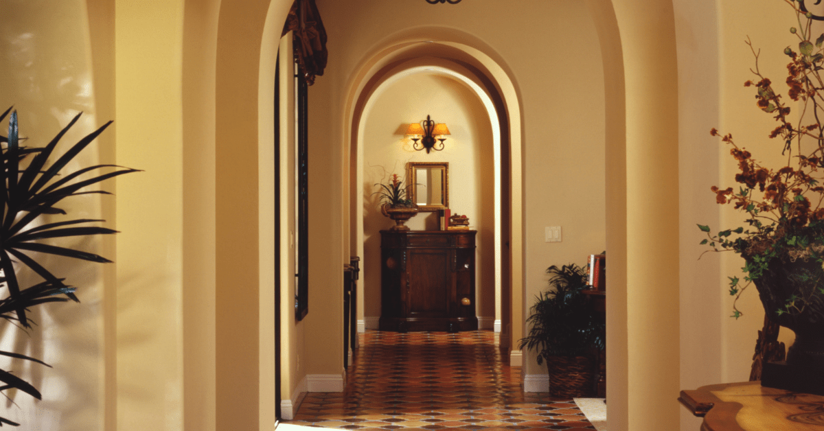 Hallway with terracotta floor tiles.
