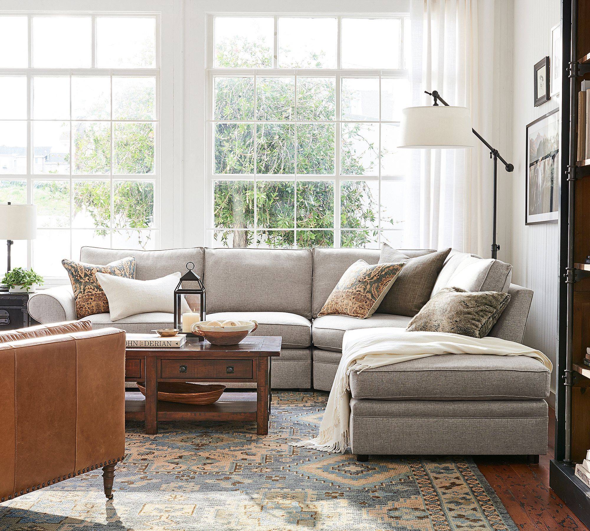 product photo pottery barn couch in living room with rustic pillows