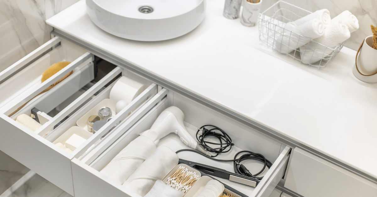 White bathroom drawer with organizer.