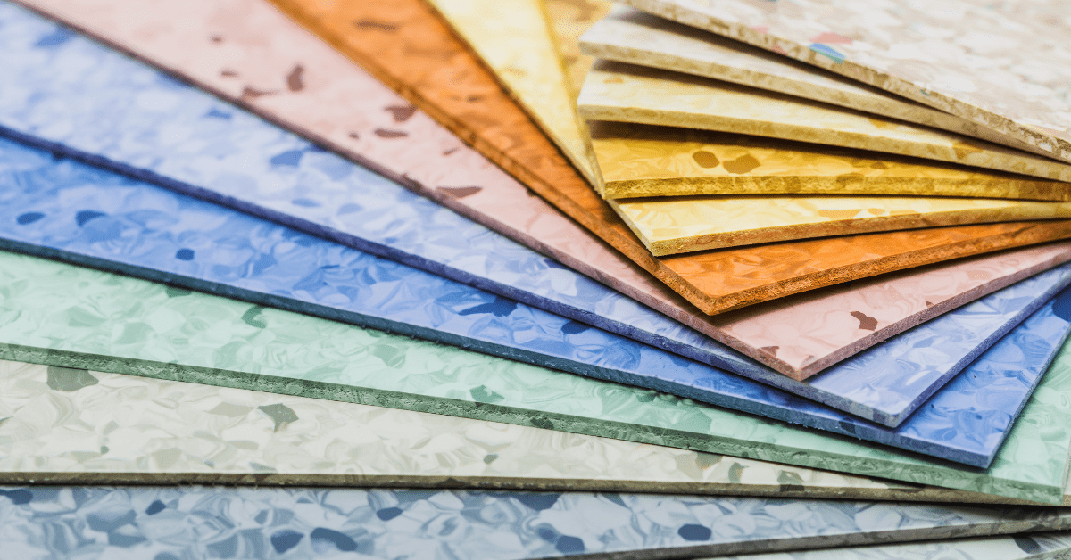 An assortment of linoleum flooring samples in various colors.