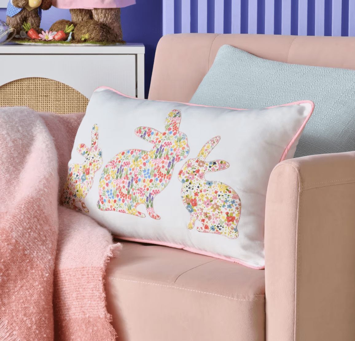 bunny floral print pillow lumbar on pink chair