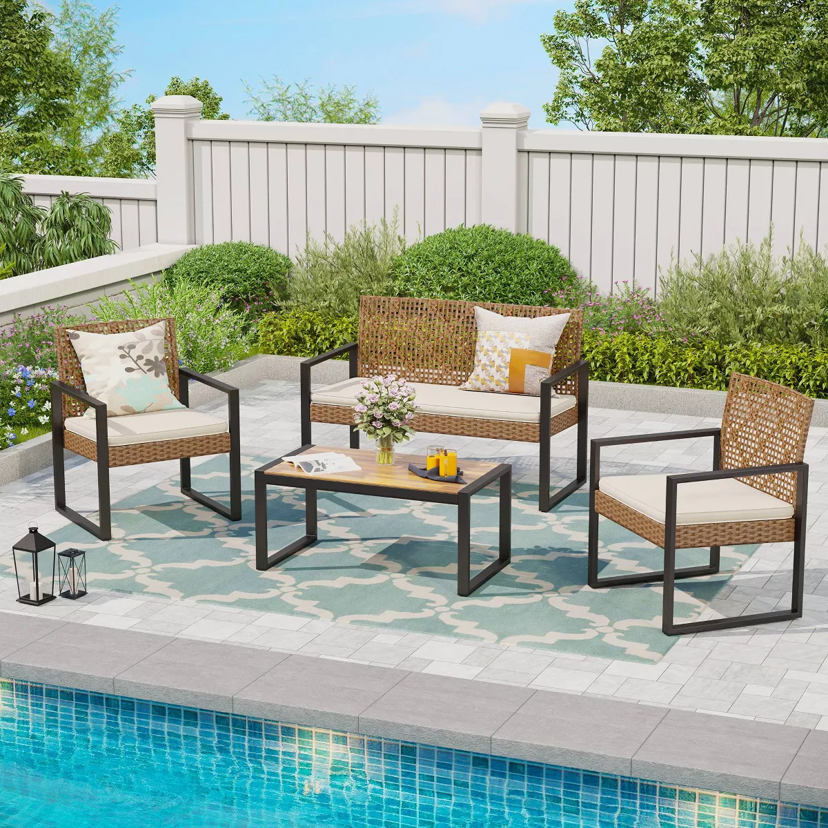 seating patio set beside pool without outdoor rug