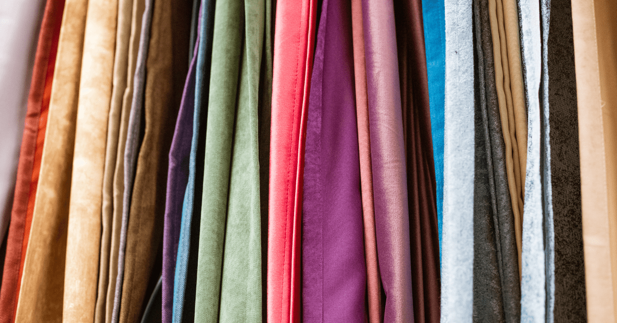 An assortment of curtains in various colors.