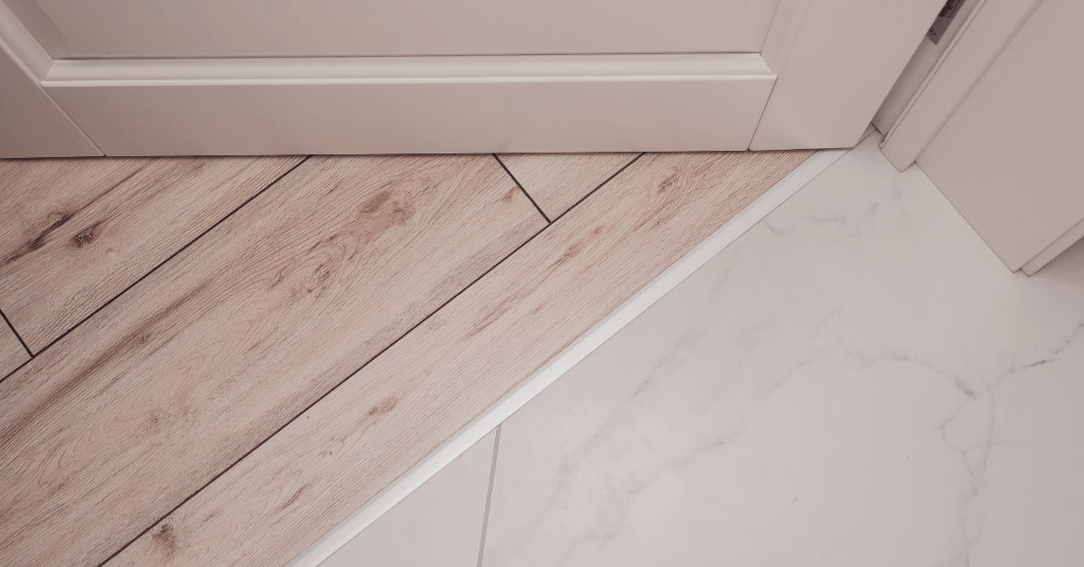 Strip transition between kitchen tile to wood flooring.