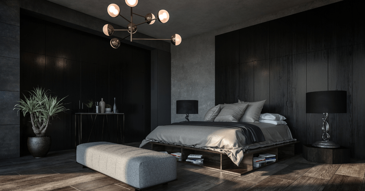 A dark bedroom with luxurious decor.