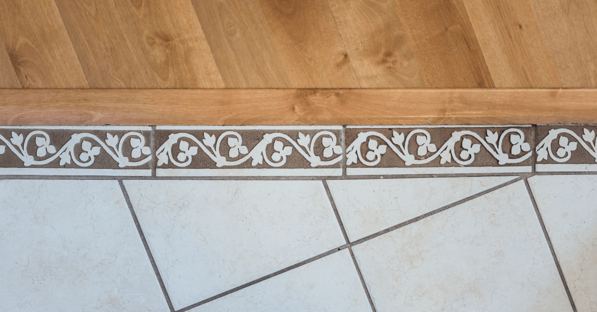 Strip transition between kitchen tile to wood flooring.