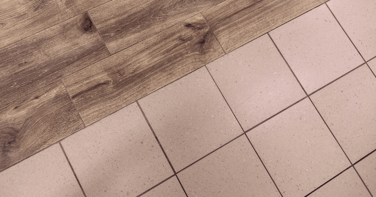 Level transition between kitchen tile to wood flooring.