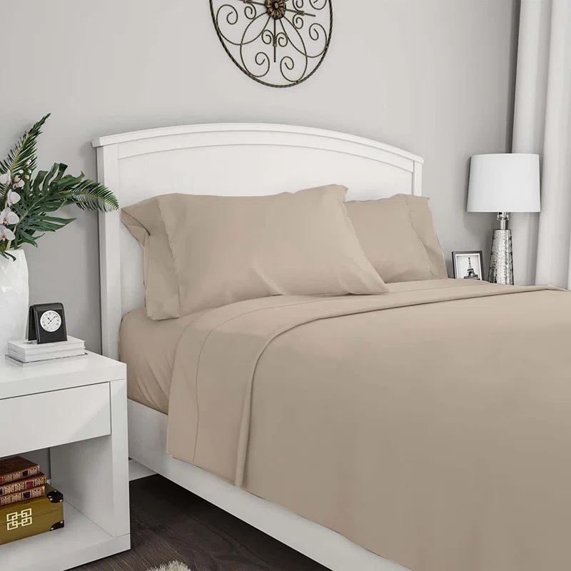 sandstone bamboo sheet set on white double bed
