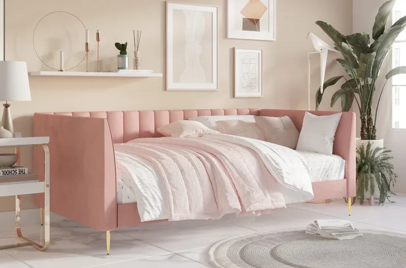 pink upholstered day bed in living room